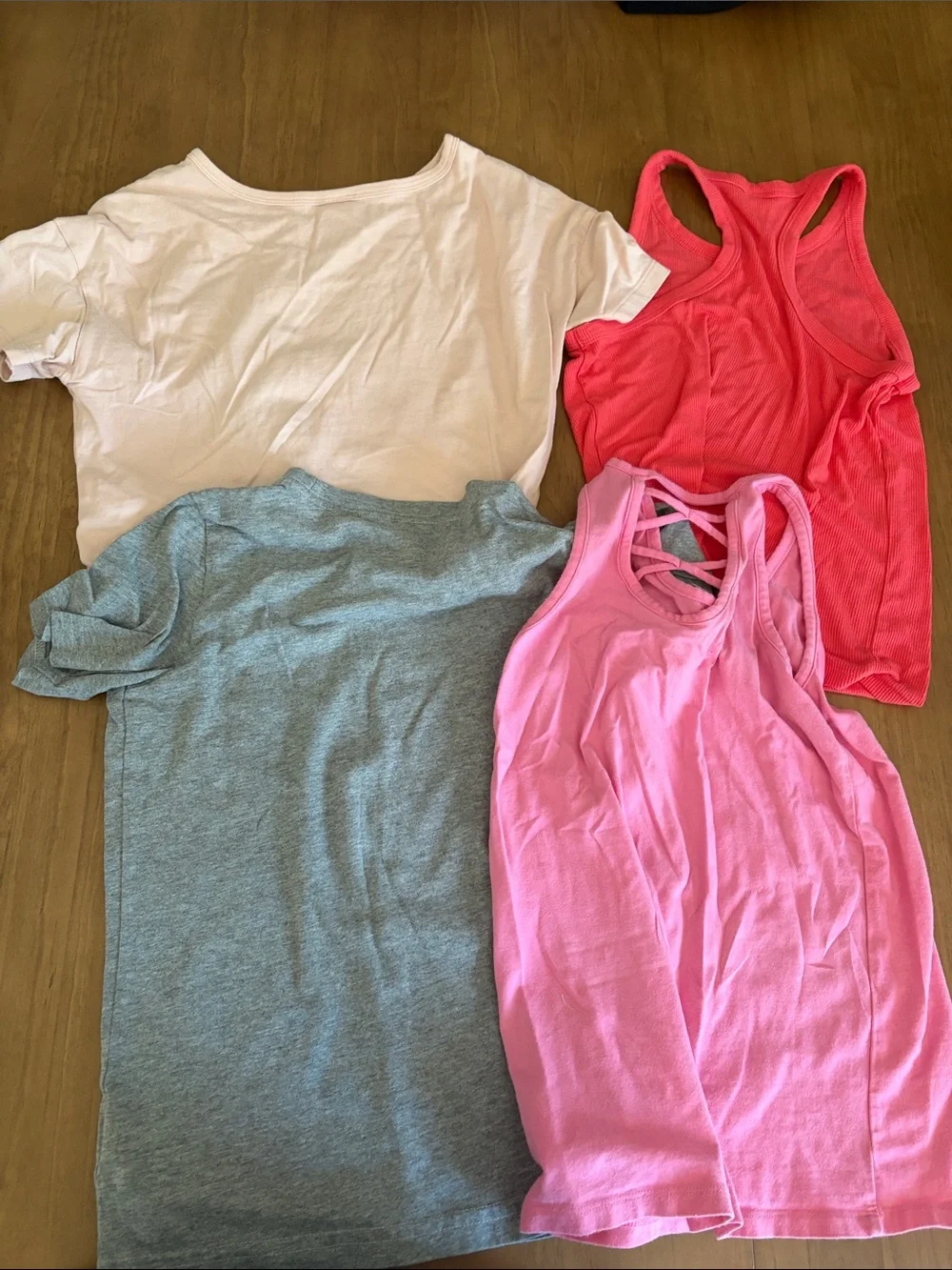 Lot of 4 Assorted Girls Large Shirts.